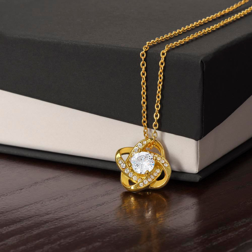 The best of all gifts around the Christmas tree is the presence of you, Love Knot Necklace