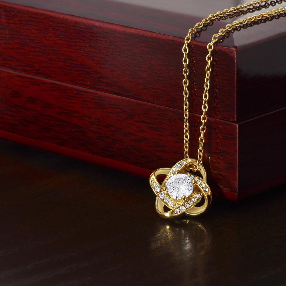 The best of all gifts around the Christmas tree is the presence of you, Love Knot Necklace