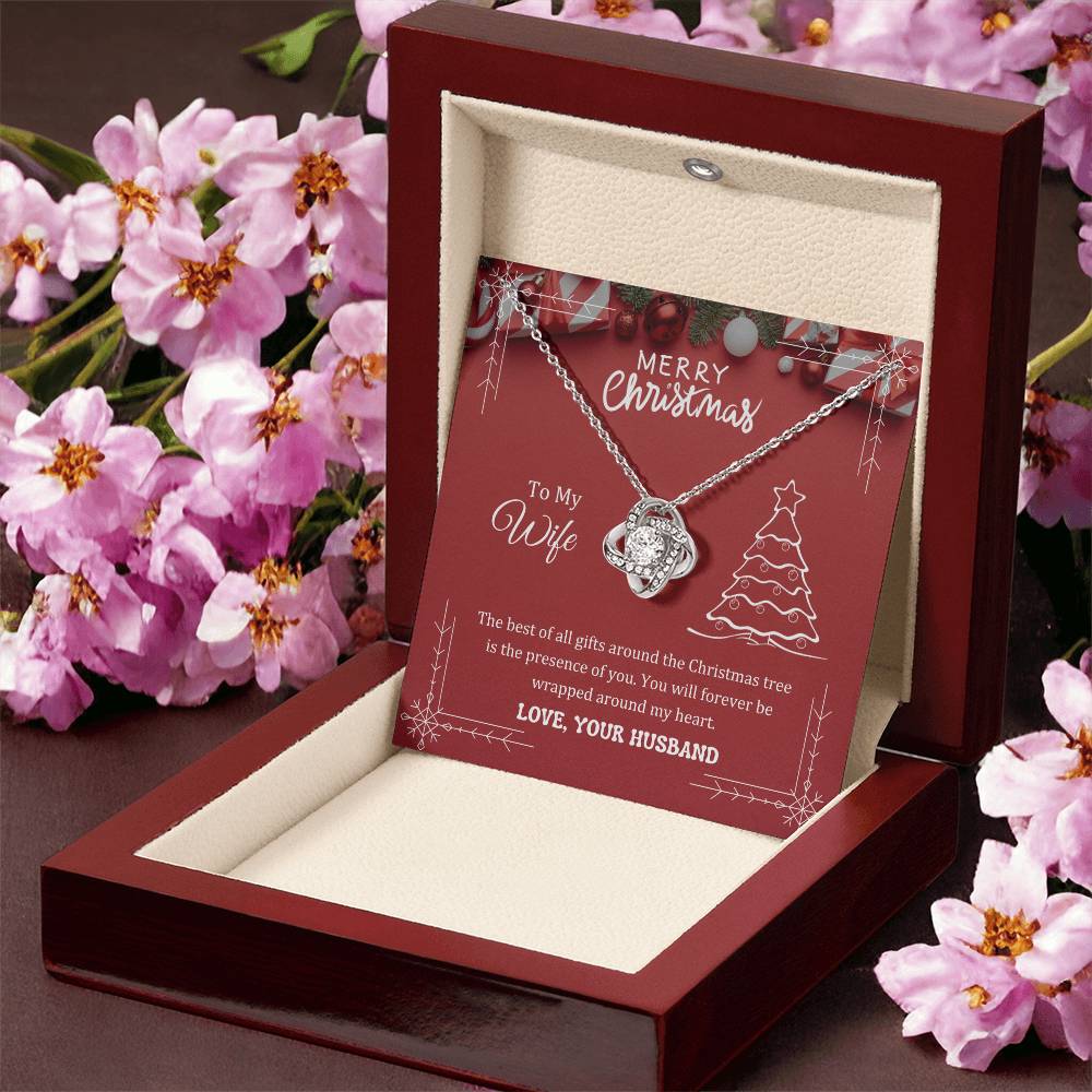 The best of all gifts around the Christmas tree is the presence of you, Love Knot Necklace